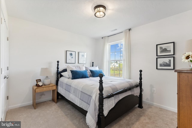 201 Fieldstone Dr Unit 23, Hanover, PA 17331 - bedroom with light colored carpet, baseboards, and visible vents