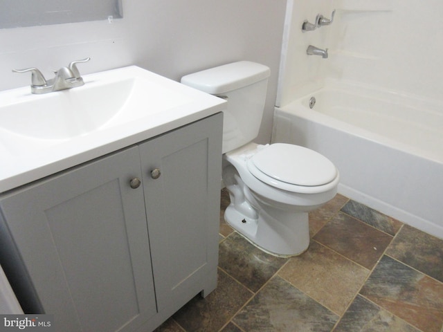 full bathroom featuring vanity, shower / washtub combination, and toilet