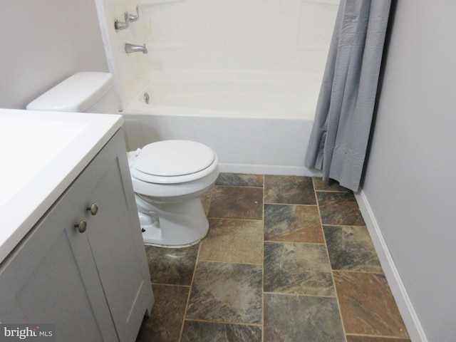 full bathroom featuring vanity, toilet, and shower / bathtub combination with curtain