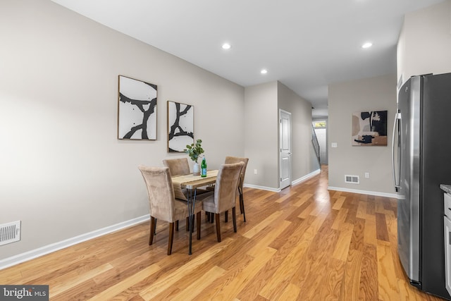 dining area featuring light hardwood / wood-style flooring