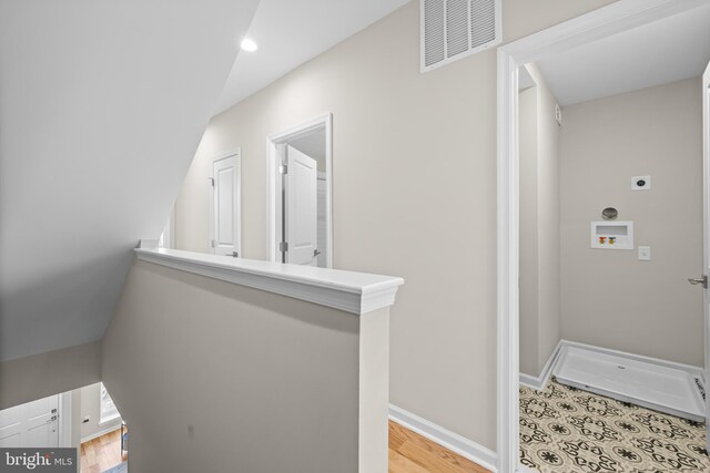 1020 N Eden St, Baltimore, MD 21205 - hallway with light wood-style flooring, baseboards, and recessed lighting