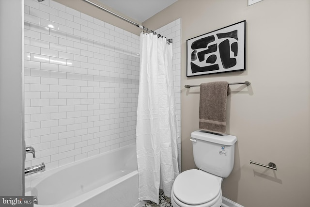 bathroom featuring shower / bath combination with curtain and toilet