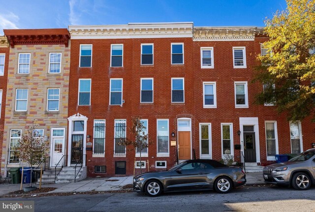 1020 N Eden St, Baltimore, MD 21205 - townhome / multi-family property with brick siding