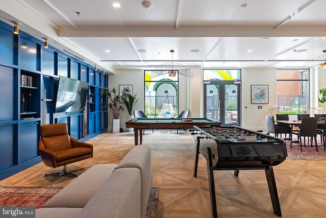 recreation room with light parquet flooring, french doors, and billiards