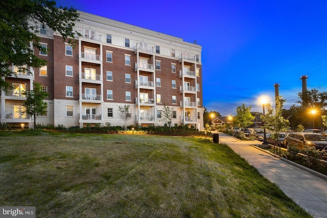 view of outdoor building at dusk