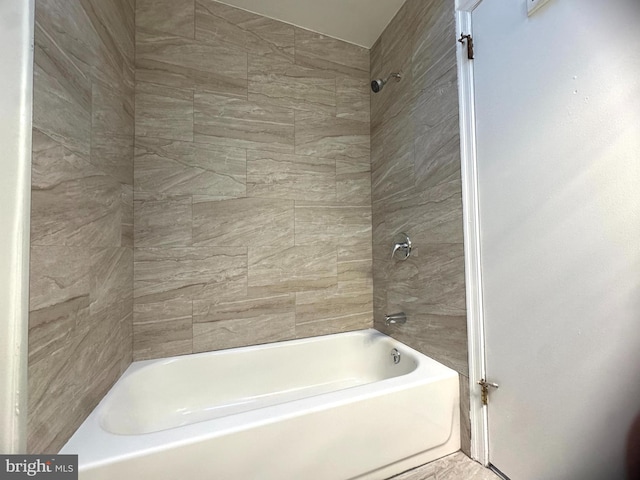 full bath featuring shower / tub combination