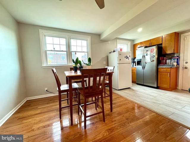 dining area featuring light hardwood / wood-style flooring and plenty of natural light