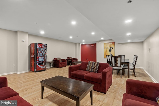 living room with light hardwood / wood-style floors