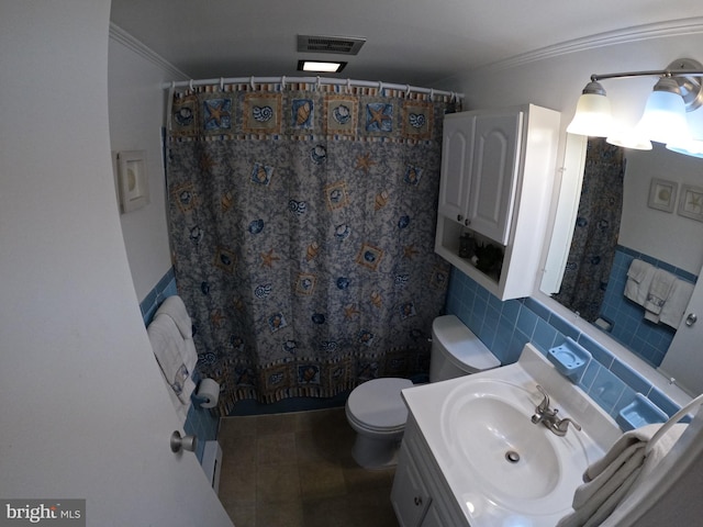 bathroom with decorative backsplash, toilet, vanity, crown molding, and tile patterned floors