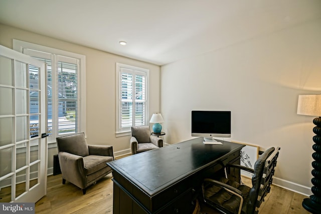 home office featuring recessed lighting, light wood-style flooring, and baseboards