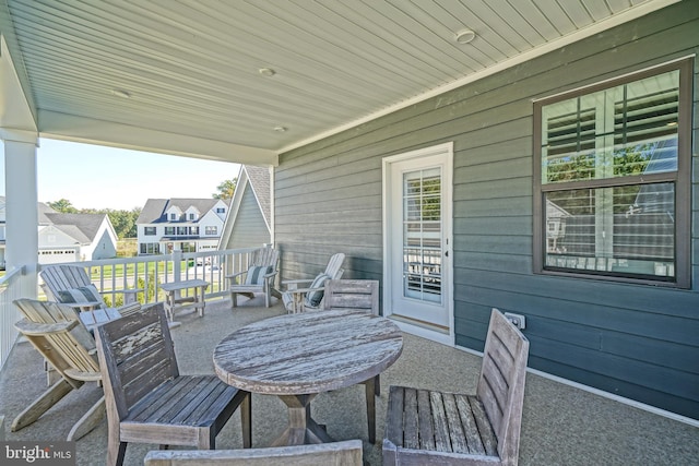 view of patio with a residential view