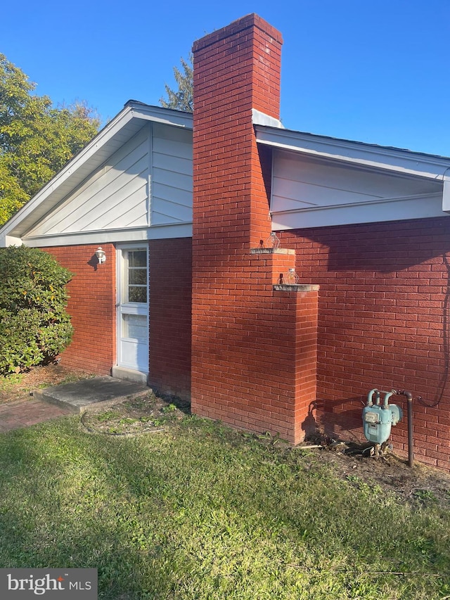 view of property exterior featuring a yard