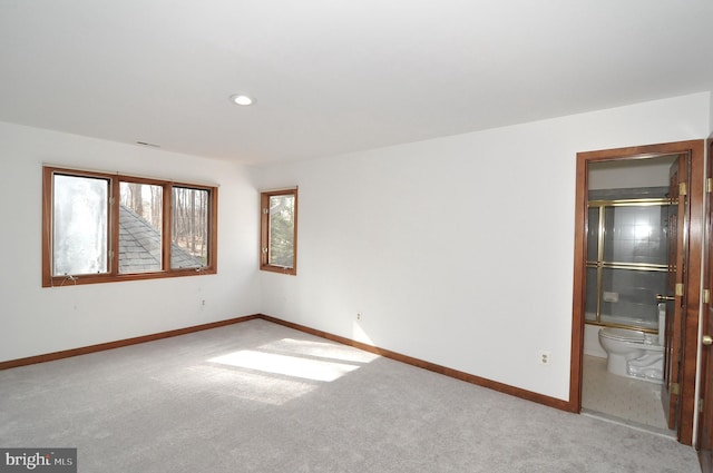 unfurnished room featuring carpet flooring