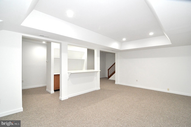 basement with light carpet