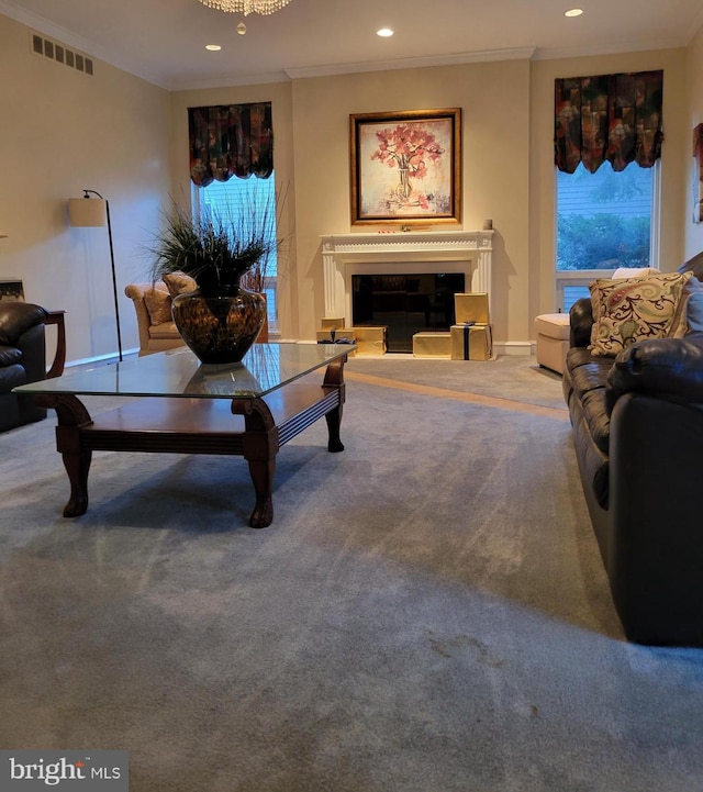 carpeted living room featuring crown molding