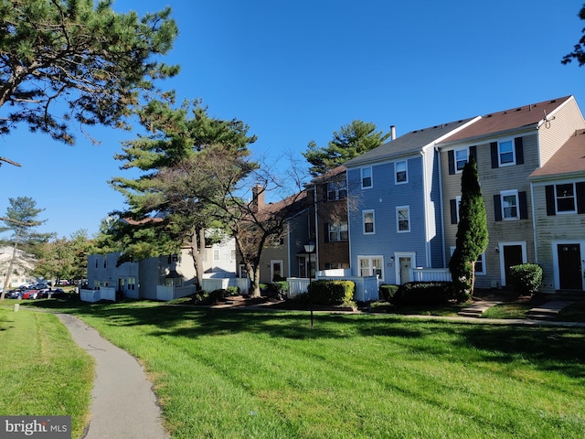 exterior space with a yard