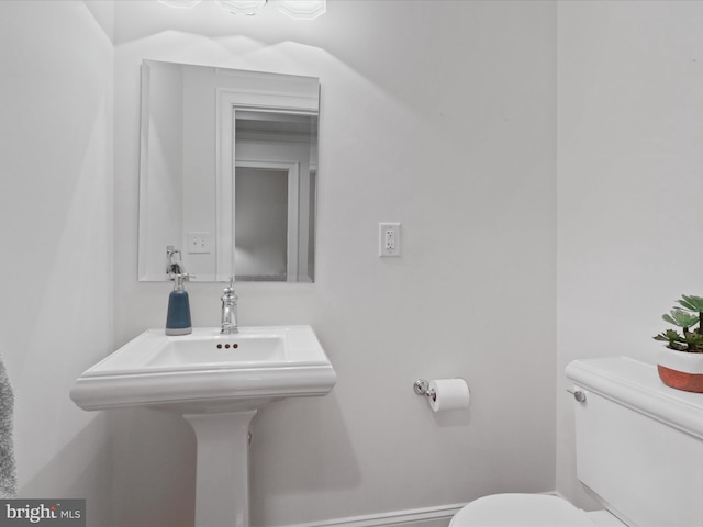 bathroom featuring toilet