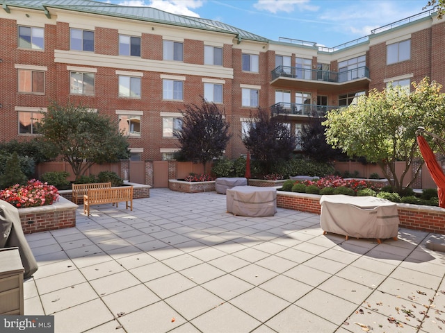 surrounding community featuring a patio