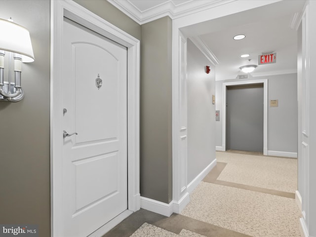 entrance foyer featuring crown molding and elevator