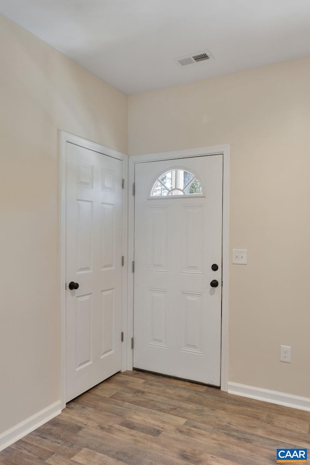 entrance foyer with light wood-type flooring