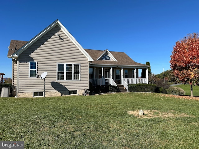 view of front of home with a porch and a front yard