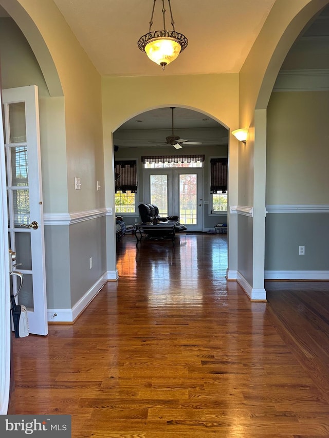 entrance foyer featuring ceiling fan and dark hardwood / wood-style flooring