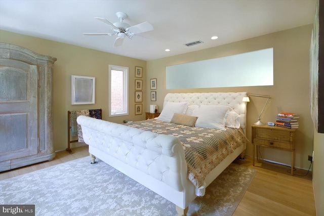 bedroom featuring wood finished floors, visible vents, ceiling fan, and recessed lighting