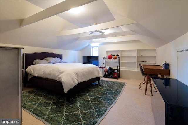 carpeted bedroom featuring lofted ceiling