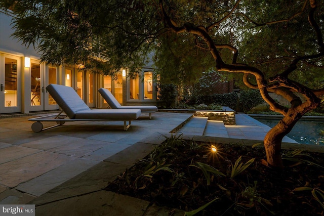 view of patio / terrace with a pool