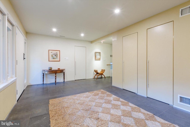 interior space with visible vents and recessed lighting