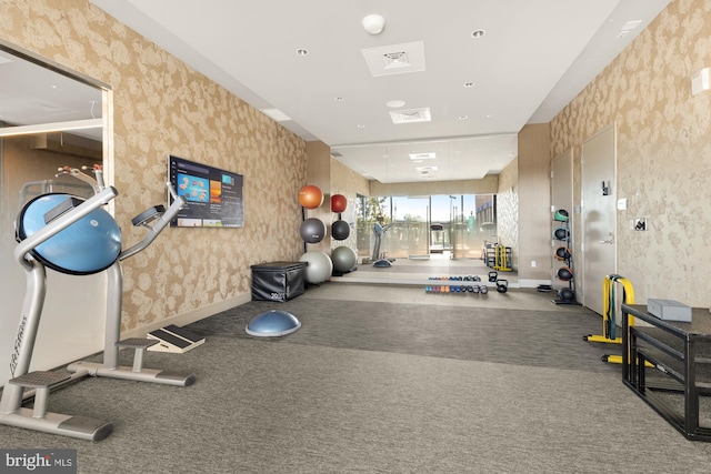 exercise room with carpet floors