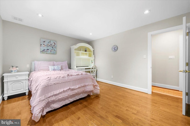 bedroom featuring hardwood / wood-style flooring