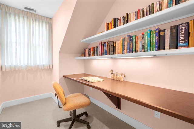 office area featuring lofted ceiling and carpet floors