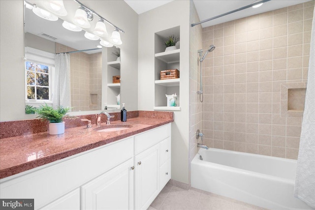 bathroom with vanity, built in features, shower / bath combination with curtain, and tile patterned flooring