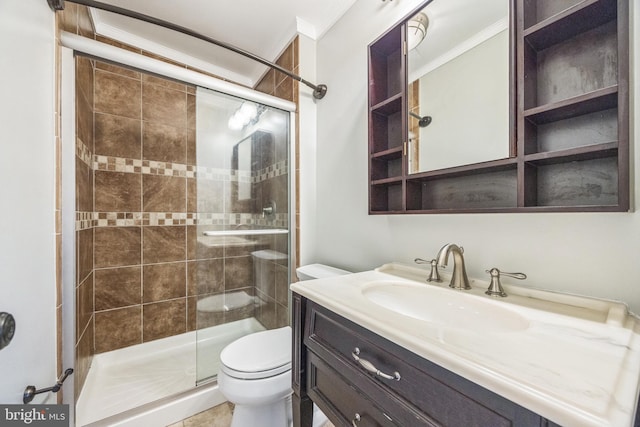 bathroom featuring vanity, crown molding, toilet, and an enclosed shower