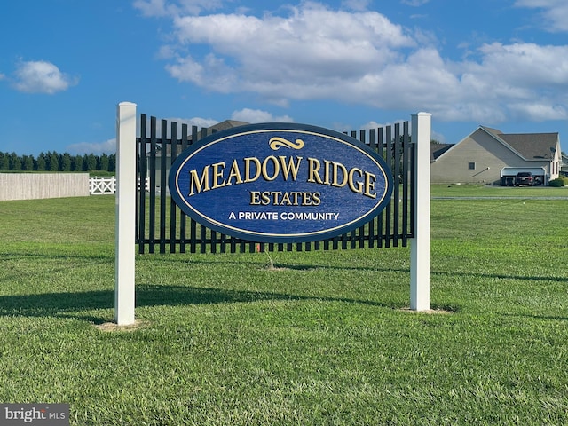 community sign with a lawn