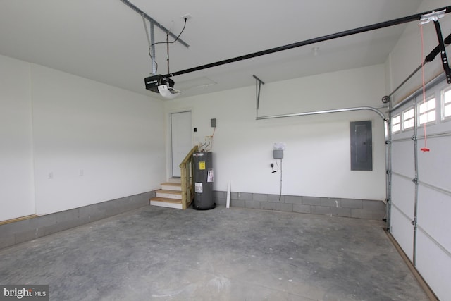 garage with a garage door opener, electric panel, and water heater