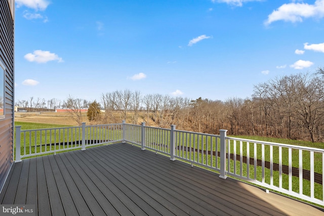 deck featuring a lawn