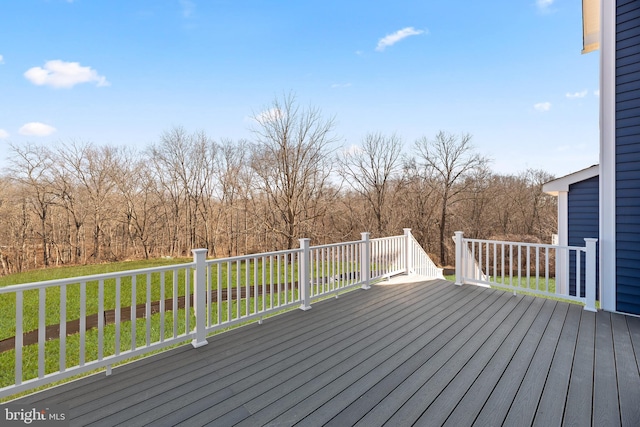 deck featuring a lawn