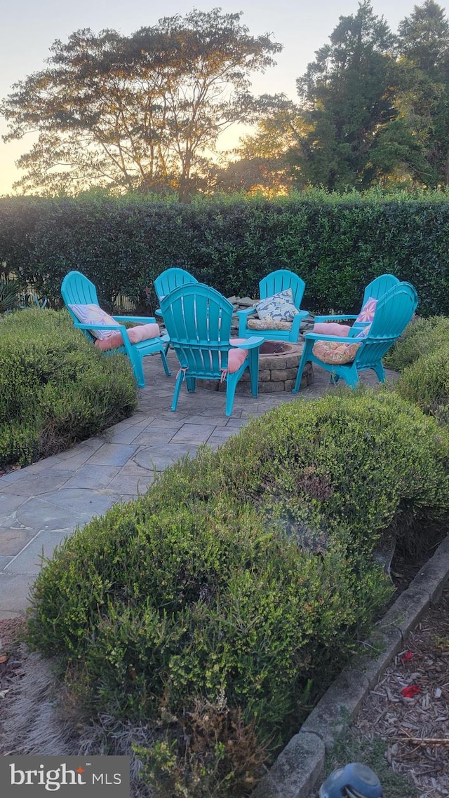 exterior space featuring an outdoor fire pit