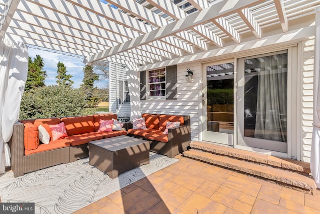 view of patio with an outdoor living space and a pergola