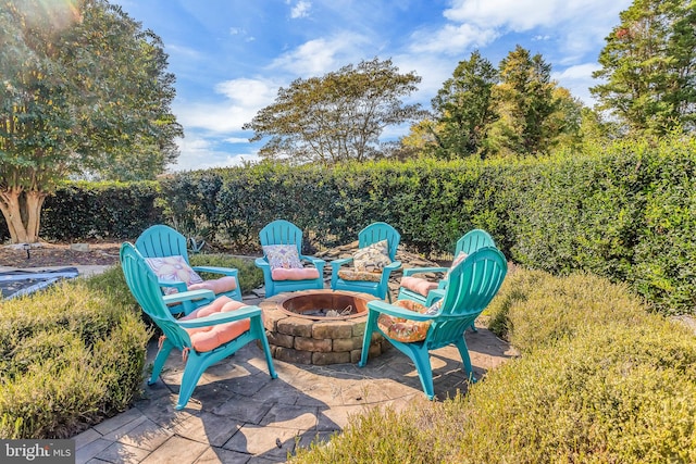 view of patio / terrace featuring a fire pit