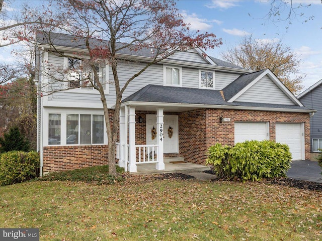 view of front of house with a front lawn and a porch