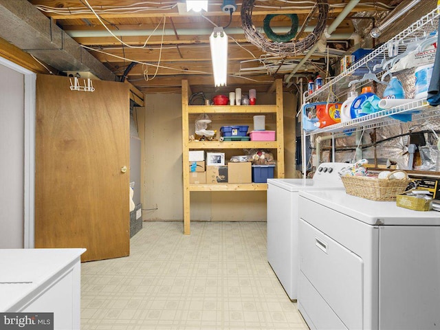 laundry area with washer and clothes dryer