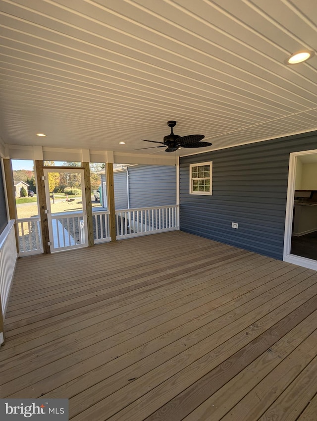 wooden terrace with ceiling fan