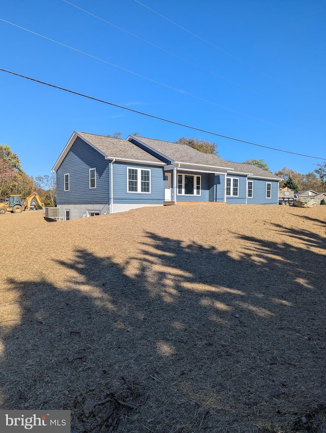 back of house with cooling unit