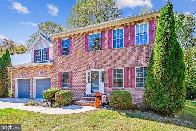 colonial-style house with a front lawn and a garage