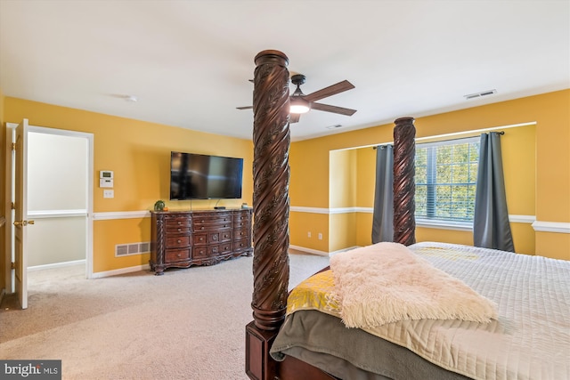 bedroom featuring ceiling fan and light colored carpet