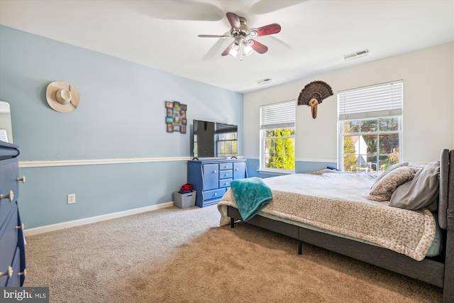 bedroom featuring carpet and ceiling fan