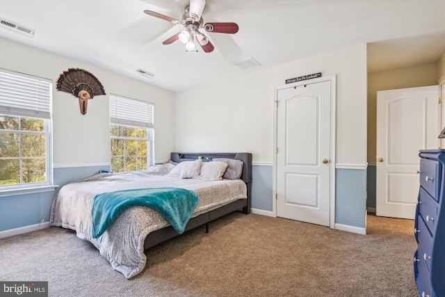 bedroom with carpet and ceiling fan